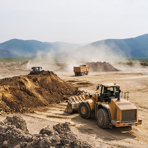 Heavy construction vehicles at work